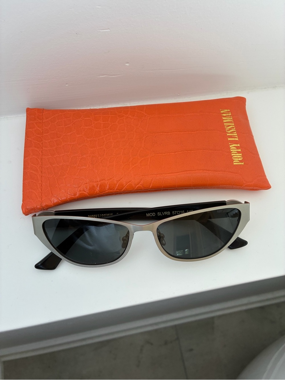 Poppy Lissiman Silver Cat-Eye Sunglasses with Black Lenses